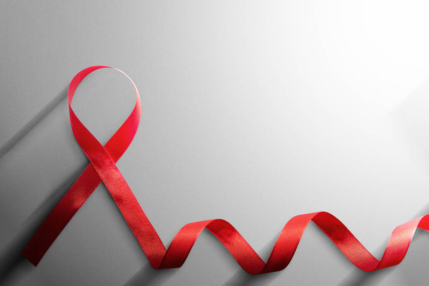 Red ribbon with white background. Hiv Aids ribbon awareness - Foto, immagini