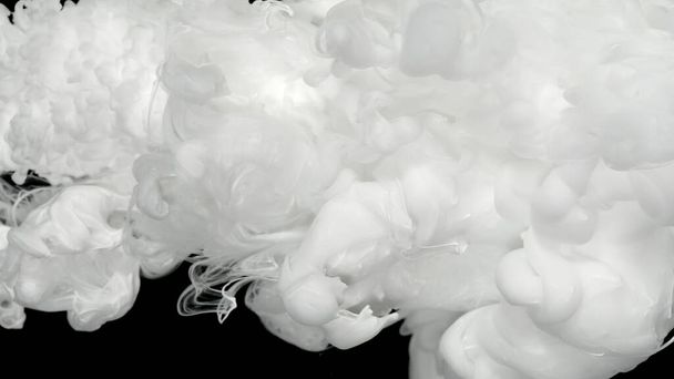 Environmental pollution concept. White cloud of ink. Relaxing meditative background. Beautiful milky white awesome abstract background. White acrylic ink in water on a black background. - Foto, immagini