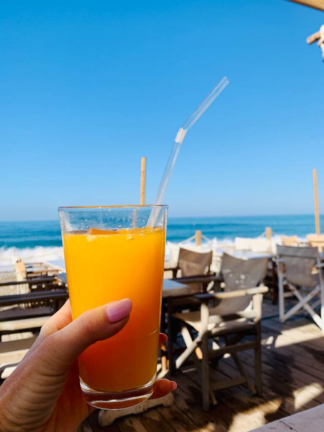 orange juice beverage and beach background pattern chill out summer - Photo, Image