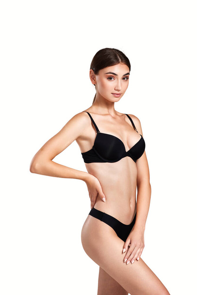 gorgeous slim woman with perfect body in black underwear - Фото, изображение