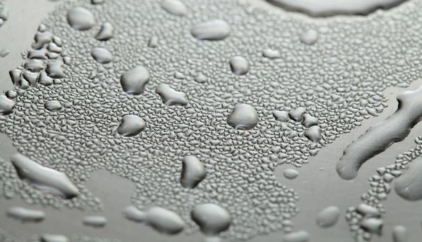 Macro background with water droplets condensation pattern on metal surface  - Foto, immagini