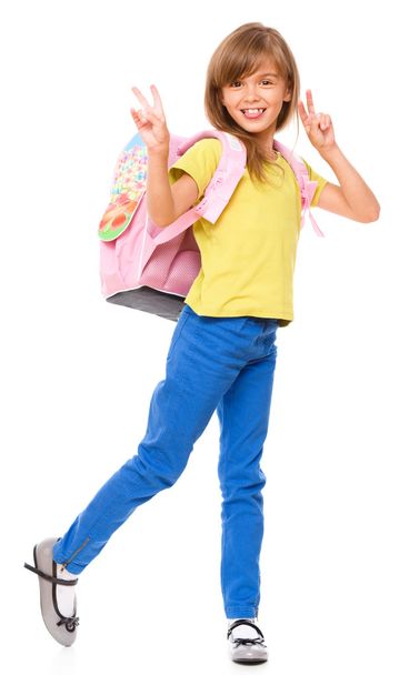 Little schoolgirl with a backpack - Фото, изображение