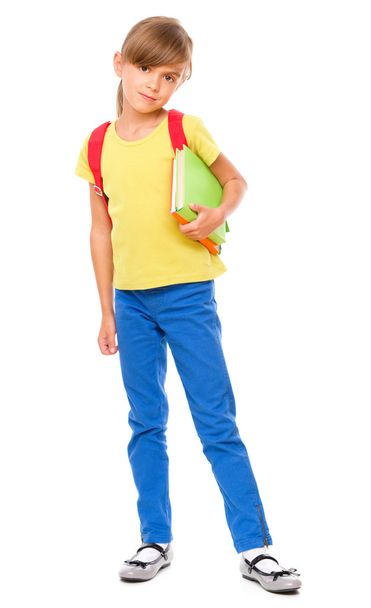 Portrait of a cute little schoolgirl with backpack - Foto, Imagen
