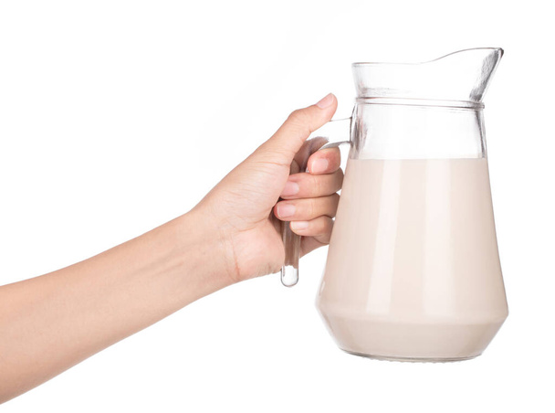 Hand holding Jug Milk isolated on a white background - Photo, Image