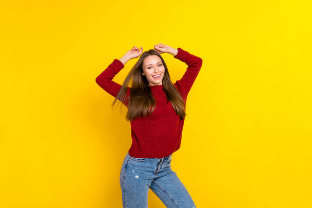 Portrait of attractive cheerful carefree girl posing air blowing hair isolated over bright yellow color background - Photo, image