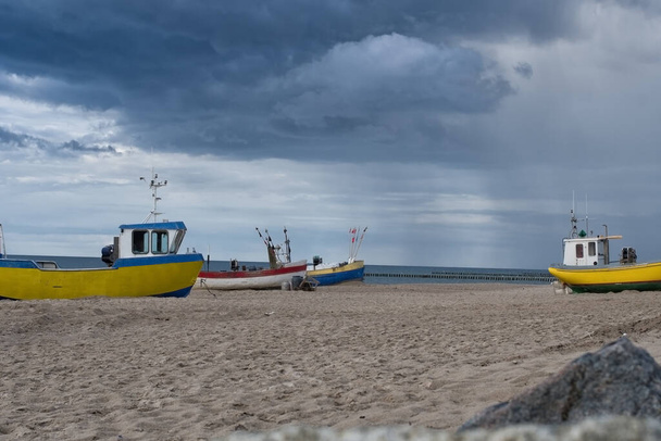 Fishing boat on the beach of the Polish Baltic coast near Rewal - Фото, изображение