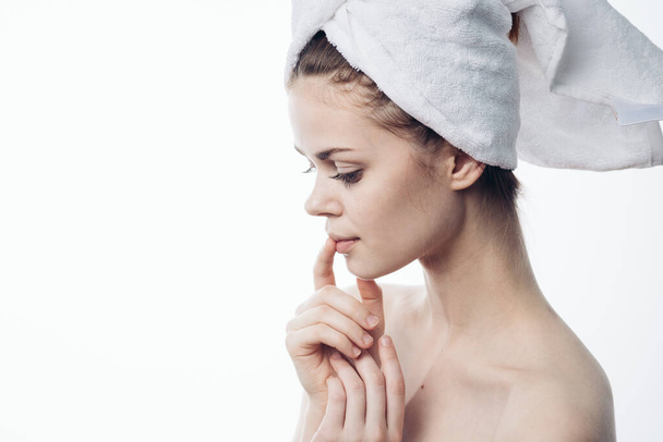 woman after shower with towel on head posing skin care - Φωτογραφία, εικόνα