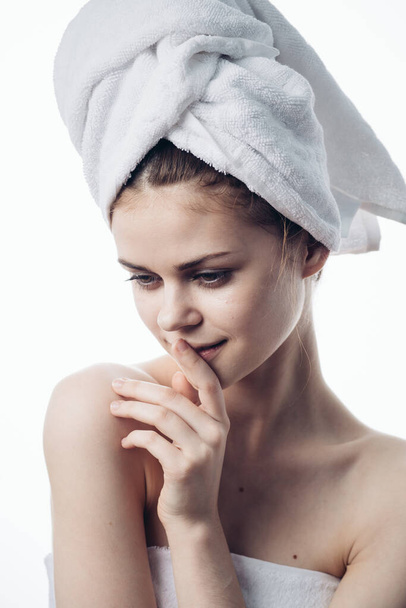 woman after shower with towel on head posing skin care - Fotografie, Obrázek