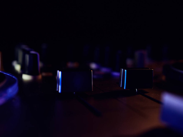 DJ midi controller at a nightclub party, lots of buttons and knobs. Party - Fotografie, Obrázek
