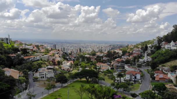 A Beautiful cityscape behind a park in Brazil - Aerial View - 映像、動画
