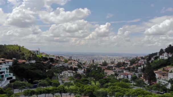 A Beautiful cityscape behind a park in Brazil - Aerial View - Video, Çekim