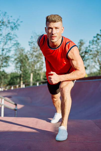 athletic man workout exercise fitness sportfit fresh air - Фото, изображение