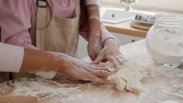 Unrecognizable Mom And Little Daughter Kneading Dough In Kitchen, Closeup - Footage, Video