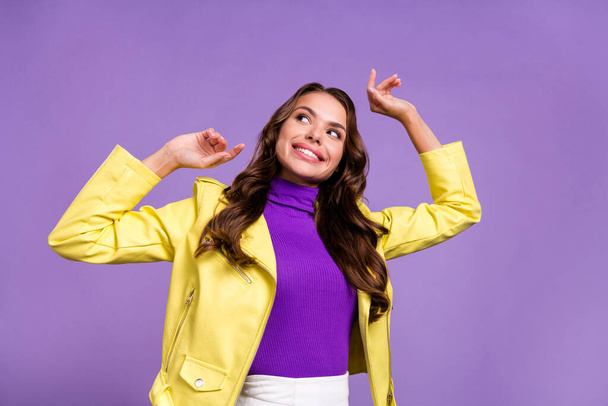 Photo of youth charming lady have fun wondered look empty space isolated over violet color background - Foto, afbeelding