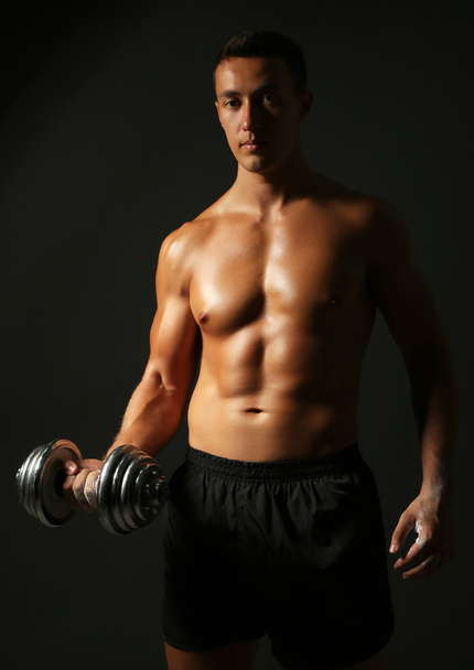 Young muscular sportsman - 写真・画像