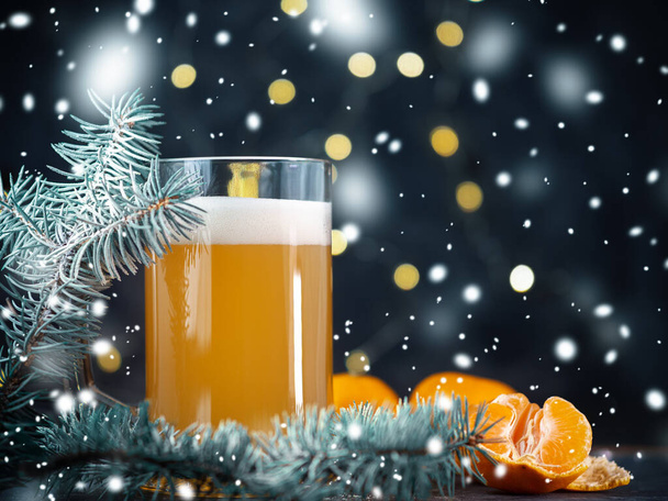 Beer mug ale on Christmas background with garland - Foto, Imagem