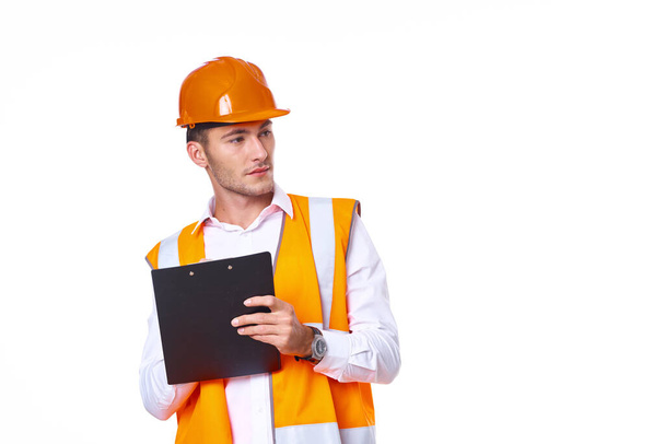 man in orange hard hat engineer work professionals construction - Foto, Imagen