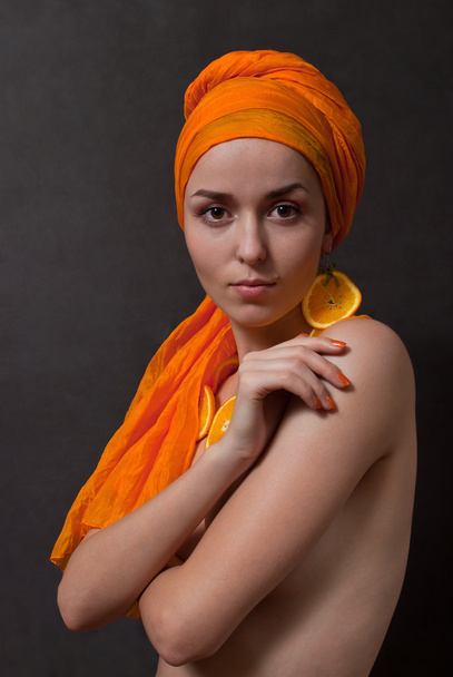 Girl with orange headscarf - Foto, imagen