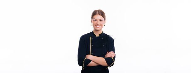 Portrait of beautiful smiling woman chef with folded hands over white  - Photo, Image