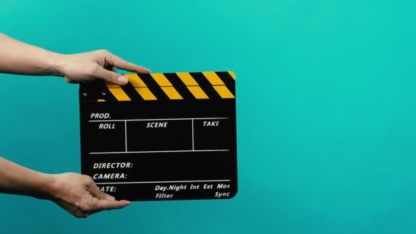 Movie Clapper Board. Hollywood Director Film Slate. Film crew hold and clapping film slate in video recording. Using for cut action or visual effects and scene prop. Clapperboard of movie production. - Footage, Video