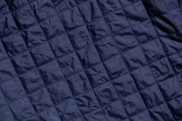 azul acolchoado jaqueta fundo, colete azul acolchoado fundo, tecido azul como fundo - Foto, Imagem