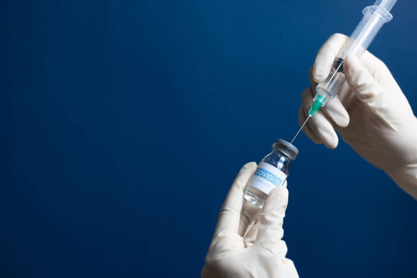 Vaccinatie-elementen met blauwe achtergrond. - Foto, afbeelding