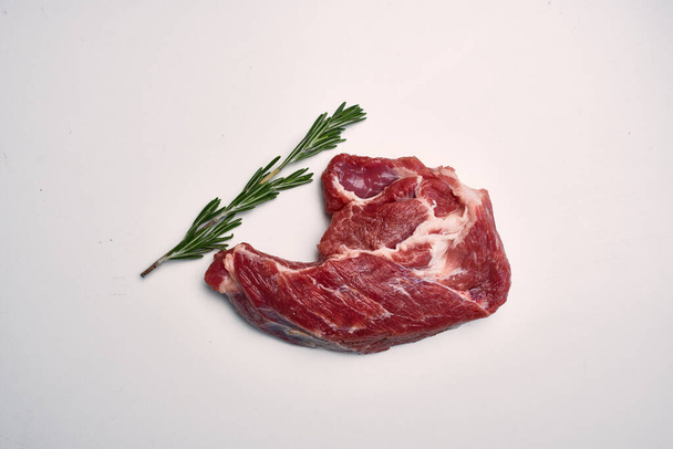 meat steak beef rosemary food yes light background - Foto, Imagen