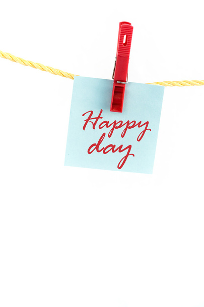 Note colored paper with the word happy day - Foto, imagen