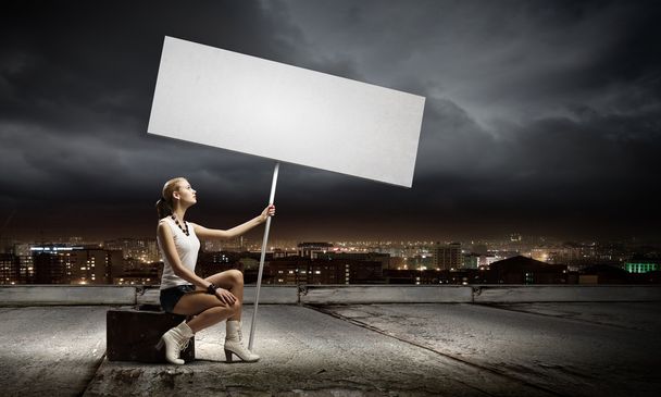 Woman with blank banner - Valokuva, kuva