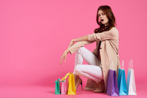 glamorous woman with multicolored bags posing isolated background - Φωτογραφία, εικόνα