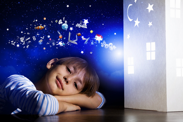 Boy dreaming about home - Photo, Image