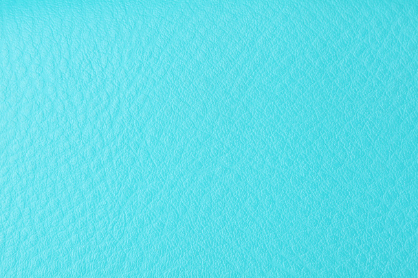 Hintergrund mit Textur aus azurblauem Leder - Foto, Bild