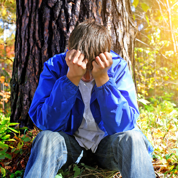 Sorrowful Teenager outdoor - Фото, изображение