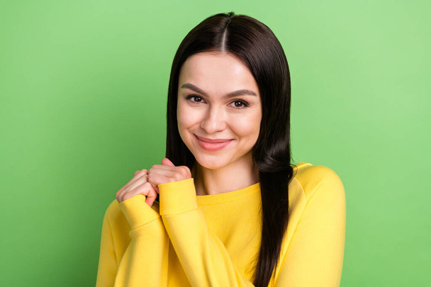 Photo portrait of pretty brunette in yellow clothes cute smiling isolated on vivid green color background - Foto, afbeelding