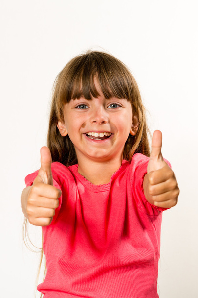 Girl with thumbs up - Photo, image