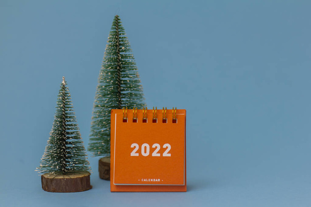 Calendar for the new year 2022. Desktop calendar on a blue background - Photo, Image