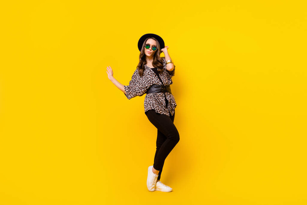 Full body photo of glamour attractive nice young woman wear luxury outfit look empty space isolated on yellow color background - Fotoğraf, Görsel