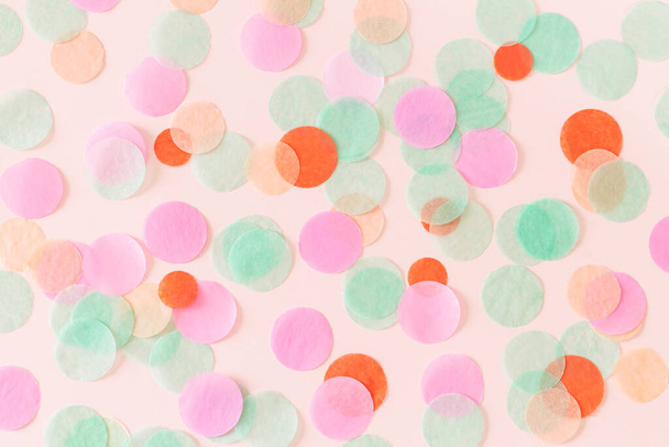 Colorful round paper party confetti background top view - Foto, imagen