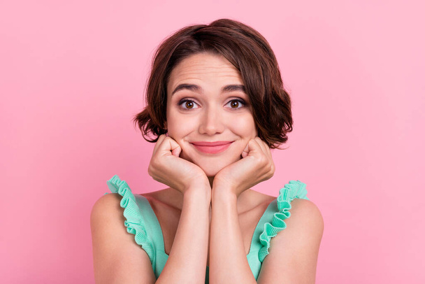 Portrait of attractive cheerful girl touching face waiting expecting news isolated over pink pastel color background - Фото, зображення