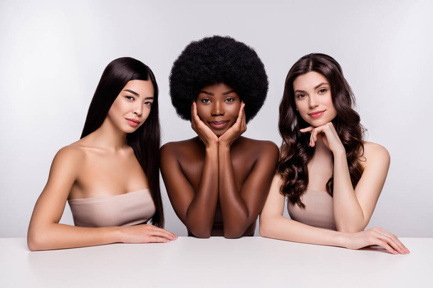 Photo of three young attractive woman hydration pampering silky pure skin isolated over grey color background - Φωτογραφία, εικόνα