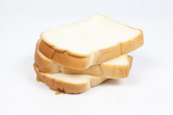 Sliced bread on a white background. - 写真・画像