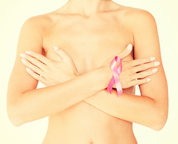naked woman with breast cancer awareness ribbon - Photo, image