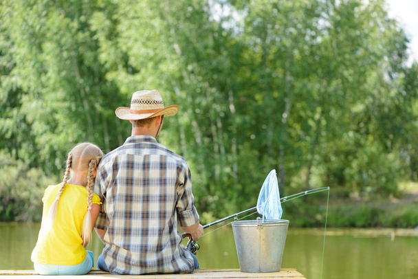 Father and daughter fishing - Foto, Imagen