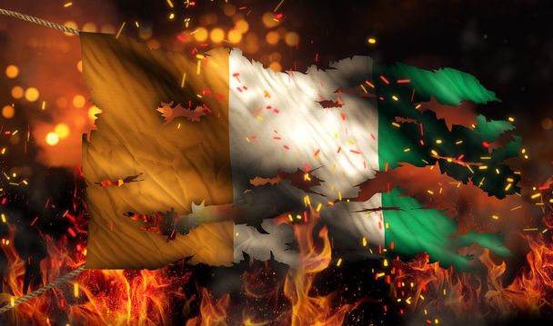 Cote D 'Ivoire Queimando Fogo Bandeira Guerra Conflito Noite 3D
 - Foto, Imagem