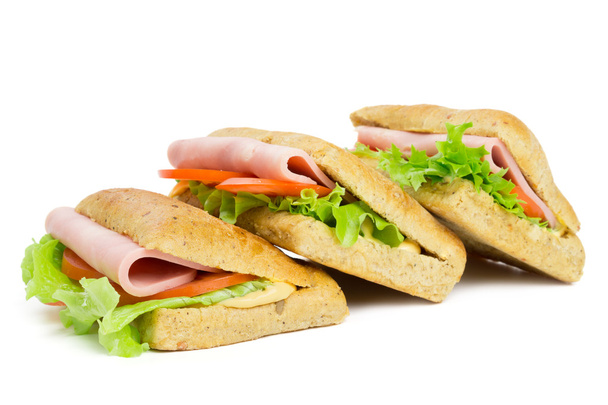 Tres sándwiches con rebanada de jamón
 - Foto, Imagen