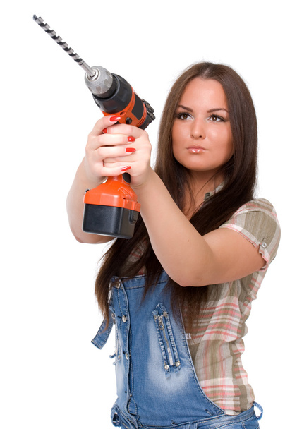 Woman holding cordless electric drill - Fotó, kép
