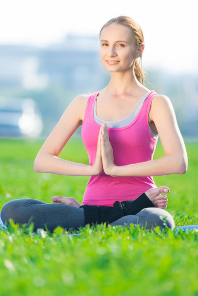 Woman doing fitness exercise yoga - Foto, Bild