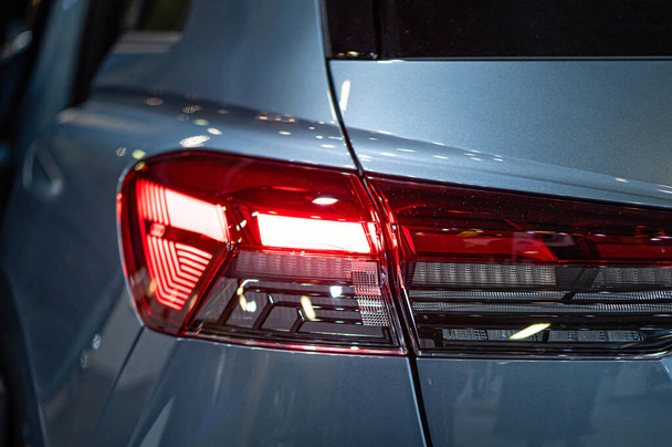 Riga, Latvia, Sep 24, 2021: rear LED lights closeup of nev Audi Q4 e-tron electric luxury SUV, model 2021, stylish exterior - Фото, изображение