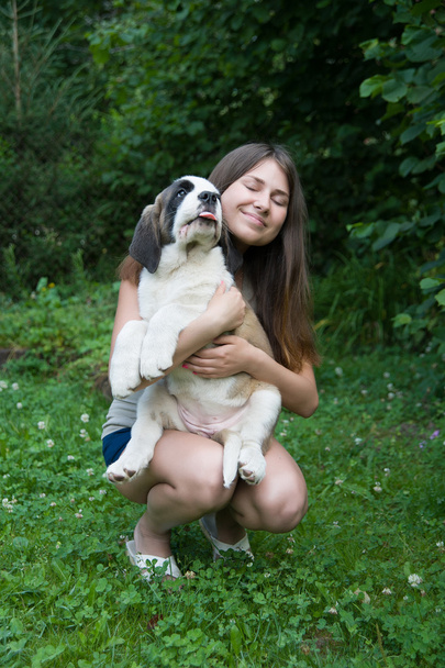 girl with puppy - Photo, Image