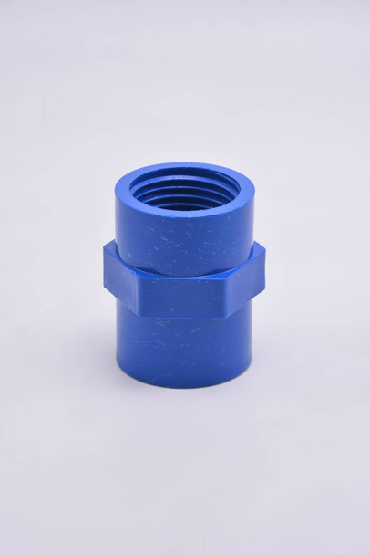 Blue pvc fitting female adapter used in water pipe connection - Foto, immagini